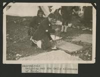 Weighing out the daily allowance of food, Macronissi (photograph), circa 1922<blockquote class="juicy-quote">Photo taken at the refugee camps on the island of Macronissi, Greece after the evacuation of Smyrna (Izmir), Turkey.</blockquote><div class="view-evidence"><a href="https://doctress.org/islandora/object/islandora:1492/story/islandora:1500" class="btn btn-primary custom-colorbox-load"><span class="glyphicon glyphicon-search"></span> Evidence</a></div>