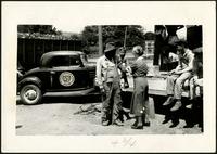 American Women's Hospitals, Rural Services mobile clinic vaccinating a man (photograph), circa 1935<blockquote class="juicy-quote">An American Women’s Hospital doctor ( in “AWH” armband) administers a shot to a local man in Jellico, Tennessee.</blockquote><div class="view-evidence"><a href="https://doctress.org/islandora/object/islandora:1859/story/islandora:2088" class="btn btn-primary custom-colorbox-load"><span class="glyphicon glyphicon-search"></span> Evidence</a></div>